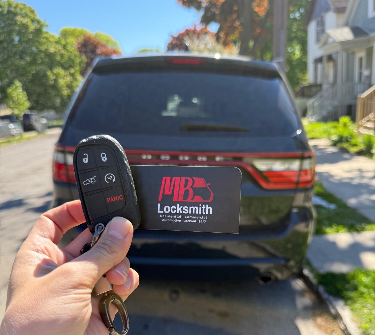 Emergency locksmith near me unlocking a car in Racine
