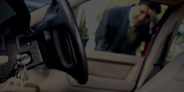 Driver locked out of vehicle with keys left in ignition — Milwaukee automotive locksmith service scenario